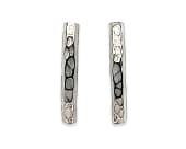 Titanium stud earrings featuring a softly textured organic pattern