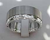 Hammered steel and silver wedding ring