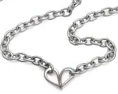 Handcrafted sterling silver necklace with a sculptural heart