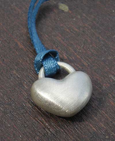 sterling silver heart on ribbon