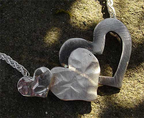 three hearts silver necklace