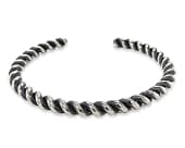 Titanium bracelet in a twisted-coil design inspired by classic rope detailing