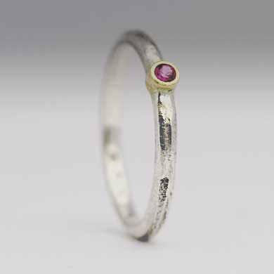 Unique pink sapphire engagement ring
