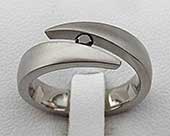 Unusual black diamond titanium engagement ring