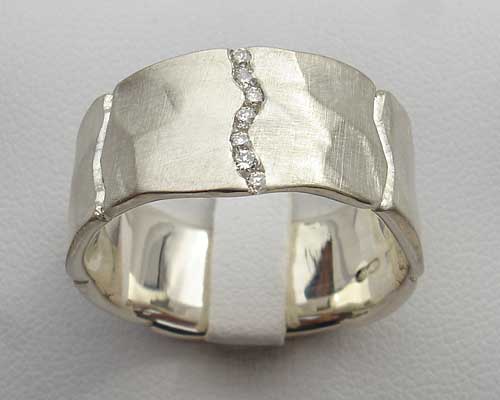 Unusual channel set silver diamond wedding ring