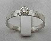 Unusual designer silver engagement ring