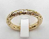 Unusual 9ct gold diamond eternity ring