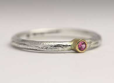 Unusual pink sapphire engagement ring