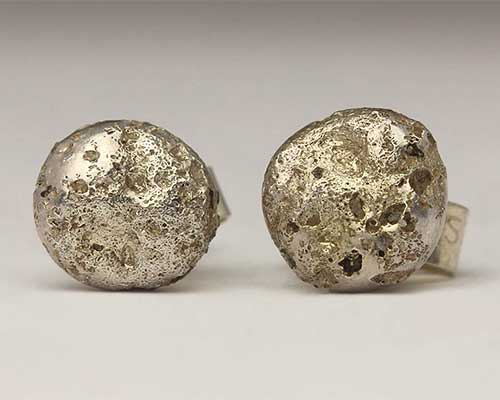 Unusual round silver stud earrings