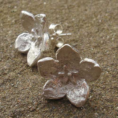 Unusual silver flower stud earrings
