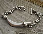 Unusual silver identity bracelet