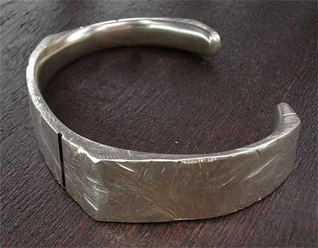 Unusual textured silver designer bracelet
