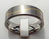 Wavy inlaid titanium wedding ring