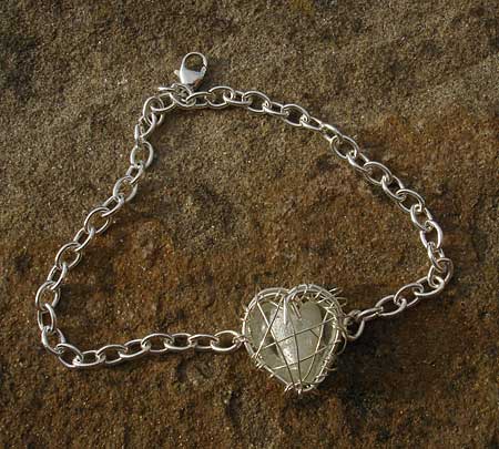 Womens designer silver heart bracelet