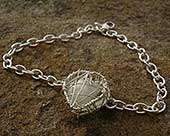 Womens designer silver heart bracelet