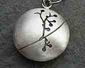 Womens silver etched pendant