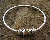 Womens unique gold and silver bangle