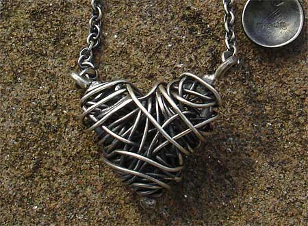 woven silver heart necklace