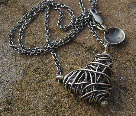 woven oxidised silver heart necklace