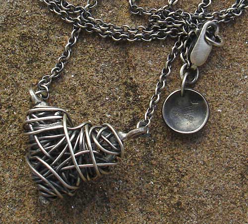 womens woven silver heart necklace